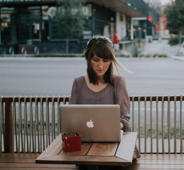 woman working at a cafe